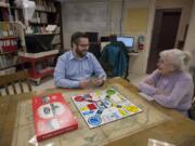 Brad Richardson, executive director of the Clark County Historical Museum, and Pat Jollota, a former director of the museum, play the local history game that Jollota helped create in the early 1990s. Local mayors will field some of the questions Jollota wrote (which are pretty hard, she confessed) next week during the inaugural “History on Tap” event at the Kiggins Theatre.