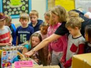 Woodland: Students learn gravity, slope, force and engineering design by building Rube Goldberg machines in Lyndal Mezes’ class for the Explorience program, a 70-minute weekly experiential learning program.