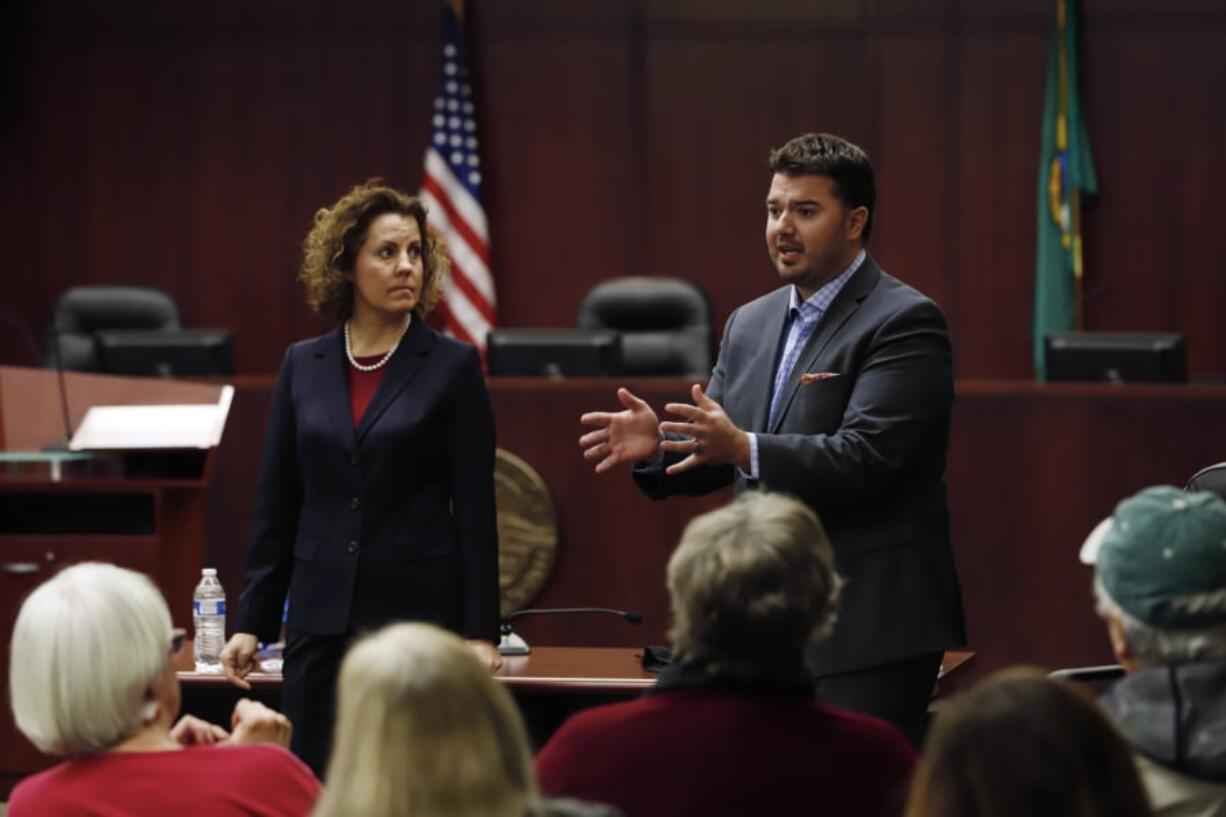 18th Legislative District representatives Sen. Ann Rivers, left, and Rep. Brandon Vick participate in a town hall meeting in Battle Ground to listen to constituents before the legislature session starts.