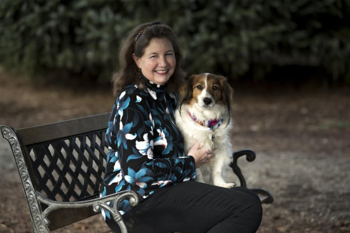 Eileen Cervantes, the new president of DOGPAW, visits Ike Memorial Dog Park with her dog Flynn, an 8-year-old Kooikerhondje.