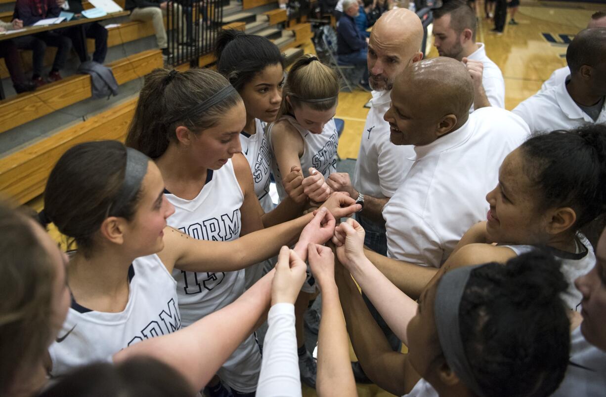 Skyview puts their hands together for a cheer after timeout during Tuesday night's game against Union at Skyview High School in Vancouver on Jan. 15, 2019.