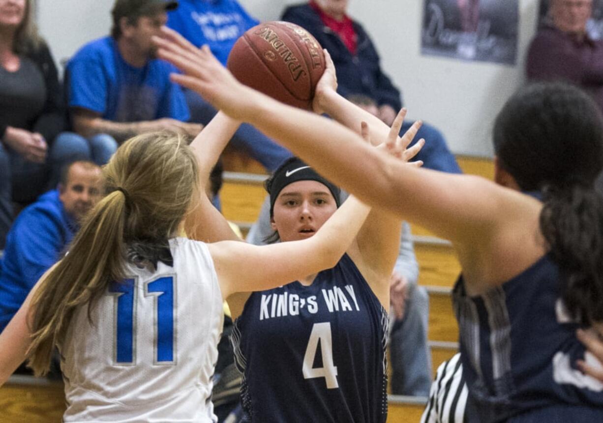 King’s Way’s Kira Zook (4) looks to pass Thursday night in La Center. King’s Way defeated La Center 39-27 to remain in first place in the Trico League.