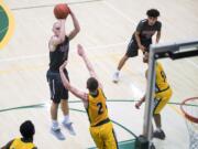 Prairie's Kameron Osborn (3) shoots during Friday night's game against Evergreen on Jan. 18, 2019. Prairie won 68-56.