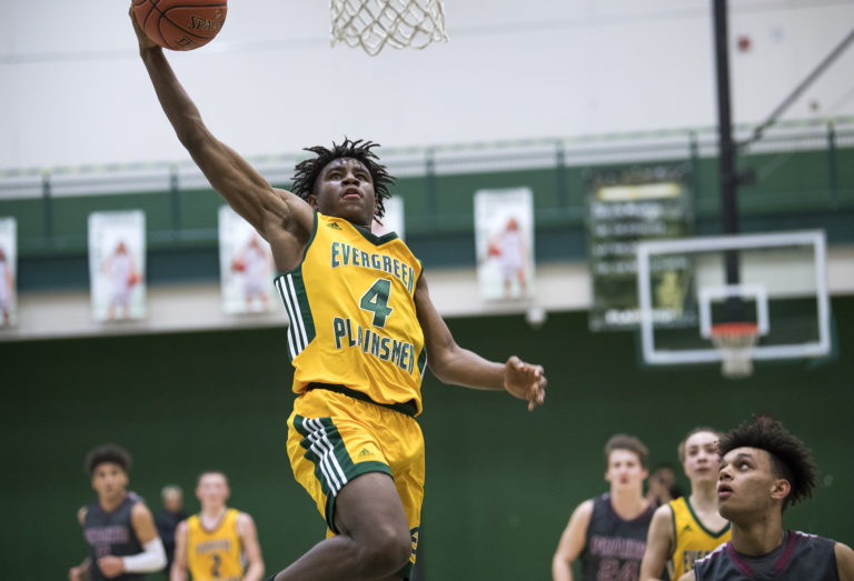 Evergreen's Zyell Griffin (4) dunks the ball during Friday night's game against Prairie on Jan. 18, 2019. Prairie won 68-56.