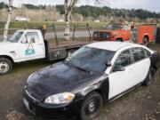 Some of the most expensive items auctioned off in the city of Woodland’s surplus auction were vehicles, including this flatbed truck, former police car and fire truck.