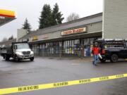 Business owners were kept from their stores Sunday after a three-alarm fire Saturday did heavy damage to the Holly Park Shopping Center. Fire restoration experts worked to secure the structure after the roof partially collapsed.