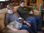 Jamie Hansen and her son Ryan, 15, talk about their experience with high medical bills at their home in La Center.
