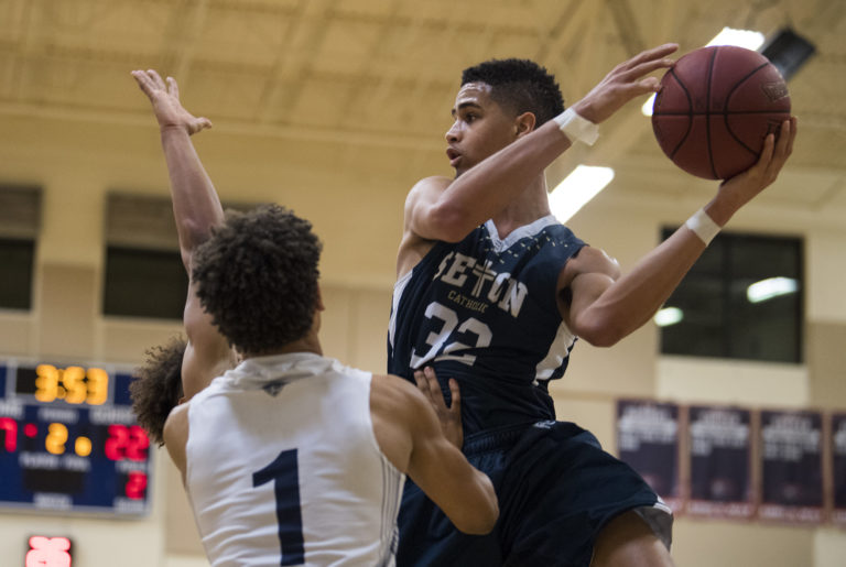 Seton's Xavian Rushing (32) looks to pass during Friday night's game at King's Way High School in Vancouver on Jan. 25, 2019. King's Way won 75-66.