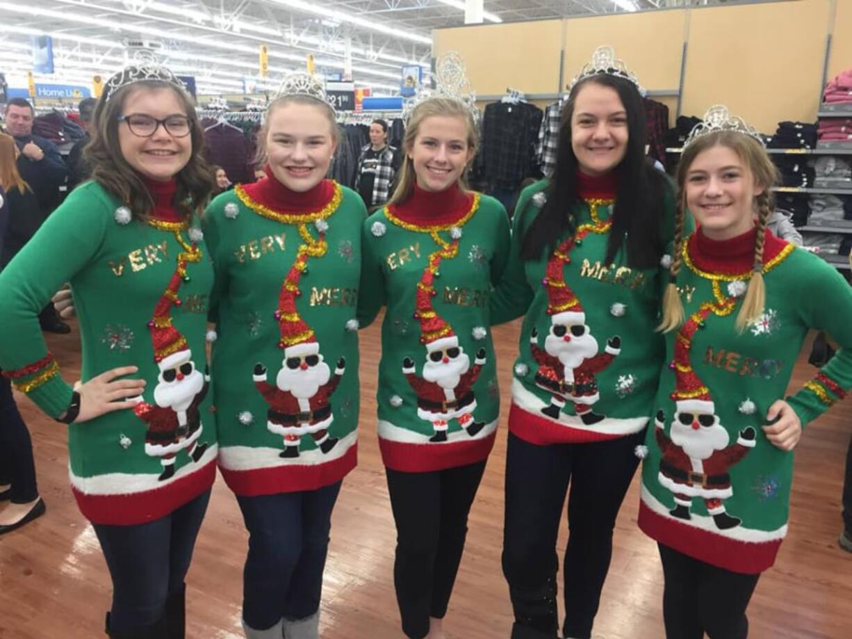 La Center: The Miss Teen La Center Court, from left, Queen Sara Baldwin and Princesses Danielle Gawronski, Grace Nolan, Keira Crocker and Raegan Boyse volunteered for Shop With a Cop.