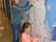 Washougal: Columbia River Gorge Elementary School fifth-graders Grace Hack, left, and Bella Bradford worked with the school’s Booster Club to create a schoolwide kindness project.