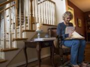 Jerri Clark sorts through her son’s medical records at her Vancouver home. Her son Calvin Clark, 23, was diagnosed with bipolar I disorder a few years ago, and in that time, his and his mother’s lives have been characterized as a roller coaster ride of hospital stays, mental health clinics visits and run-ins with the criminal justice system. Now, Jerri Clark is a champion for the group Mothers of the Mentally Ill, which is pushing for meaningful changes in the state’s mental health care system.