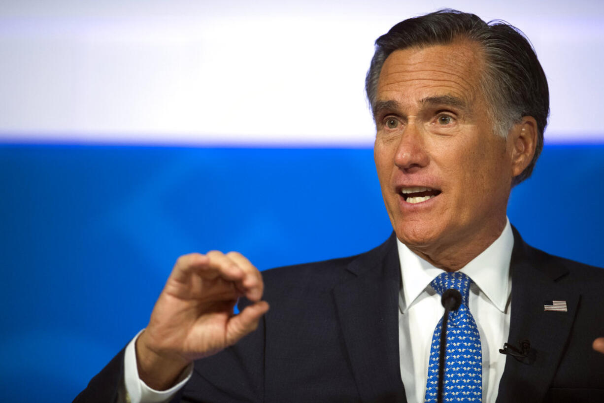 File-This Oct. 9, 2018, file photo shows Republican U.S. Senate candidate Mitt Romney answering a question about tariffs during the debate with Democratic opponent Jenny Wilson in the America First Event Center in Cedar City, Utah. Utah Sen.-elect Romney says President Donald Trump's "conduct over the past two years ... is evidence that the president has not risen to the mantle of the office." Romney, who was the Republican presidential nominee in 2012, is praising some of Trump's policy decisions in a Washington Post op-ed published Tuesday, Jan. 1, 2019. But he adds: "With the nation so divided, resentful and angry, presidential leadership in qualities of character is indispensable. And it is in this province where the incumbent's shortfall has been most glaring."(James M.