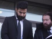 Jaskirat Singh Sidhu leaves provincial court with his lawyer Mark Brayford, right, in Melfort, Saskatchewan, Tuesday, Jan. 8, 2019. Sidhu, the driver of a transport truck involved in a bus crash that killed 16 people with the Humboldt Broncos junior hockey team in Canada last year has has pleaded guilty to all charges against him. Sidhu was charged with 16 counts of dangerous driving causing death and 13 charges of dangerous driving causing bodily harm.