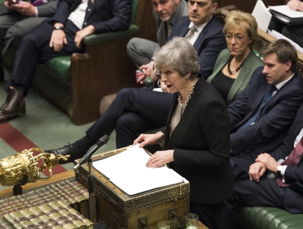 Britain’s Prime Minister Theresa May reacts as she addresses the house of Commons Parliament during the debate on Britain’s Brexit European Union Withdrawal Act, in London, Tuesday Jan. 29, 2019. Seeking to break the parliamentary deadlock on Britain’s Brexit from Europe, Theresa May says she plans to seek a change on the divorce deal between Europe and the U.K.