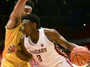 Washington State forward Robert Franks (3) drives to the basket as California forward Justice Sueing (10).