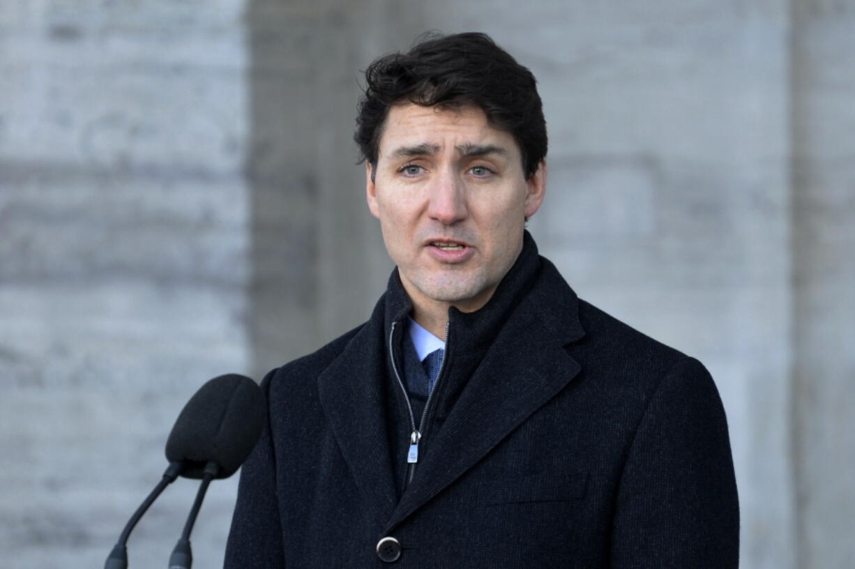 Prime Minister Justin Trudeau addresses the media in Ottawa, Ontario on Monday, Jan. 14, 2019. A Chinese court sentenced Robert Lloyd Schellenberg, a Canadian man to death Monday in a sudden retrial in a drug smuggling case. Trudeau said he is extremely concerned that China chose to “arbitrarily” apply the death penalty to a Canadian citizen.