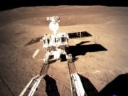 Yutu-2, China’s lunar rover, leaves wheel marks after leaving the lander that touched down on the moon Thursday.