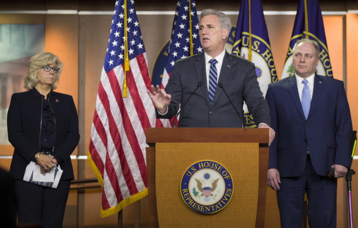 House Minority Leader Kevin McCarthy of Calif., center, speaks accompanied by House Republican Conference chair Rep. Liz Cheney, R-Wyo., left, and House Minority Whip Steve Scalise of La., during a news conference on Capitol Hill, Tuesday, Jan. 15, 2019 in Washington.