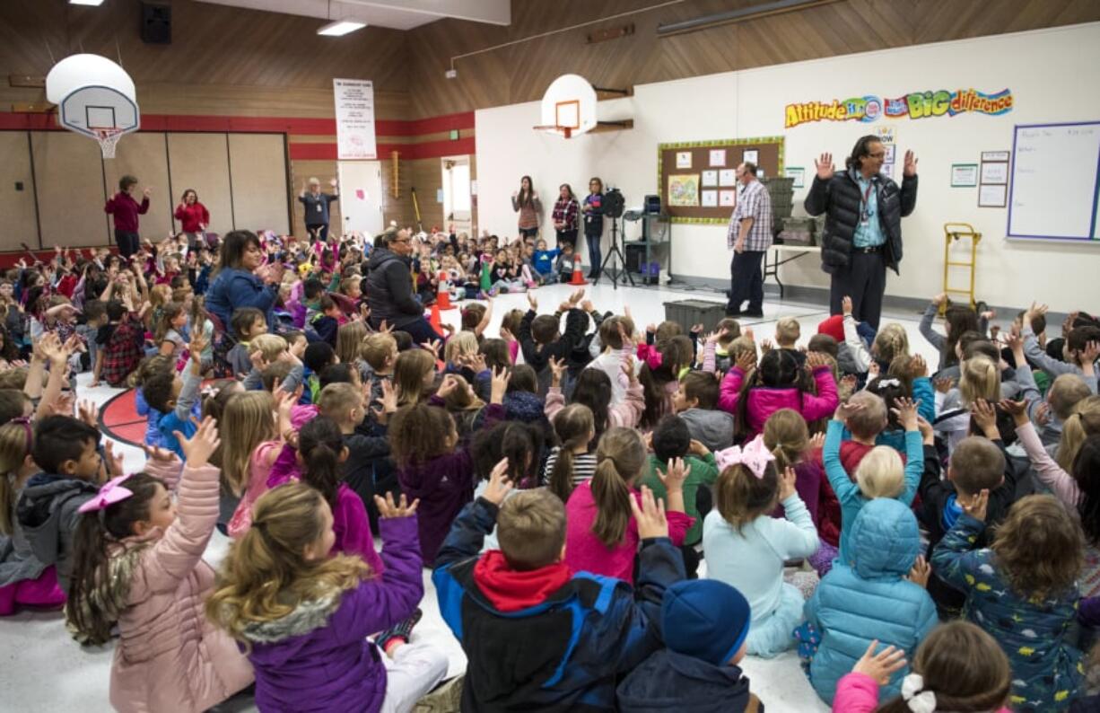 Students file in and out of the gym for an assembly at Glenwood Heights Primary School. The student body splits into two groups during assemblies because not all of the approximately 800 students can fit in the gym at once. Battle Ground’s school board is considering boundary change options that would alleviate overcrowding at the campus.