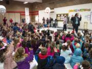 Students file in and out of the gym for an assembly at Glenwood Heights Primary School. The student body splits into two groups during assemblies because not all of the approximately 800 students can fit in the gym at once. Battle Ground’s school board is considering boundary change options that would alleviate overcrowding at the campus.