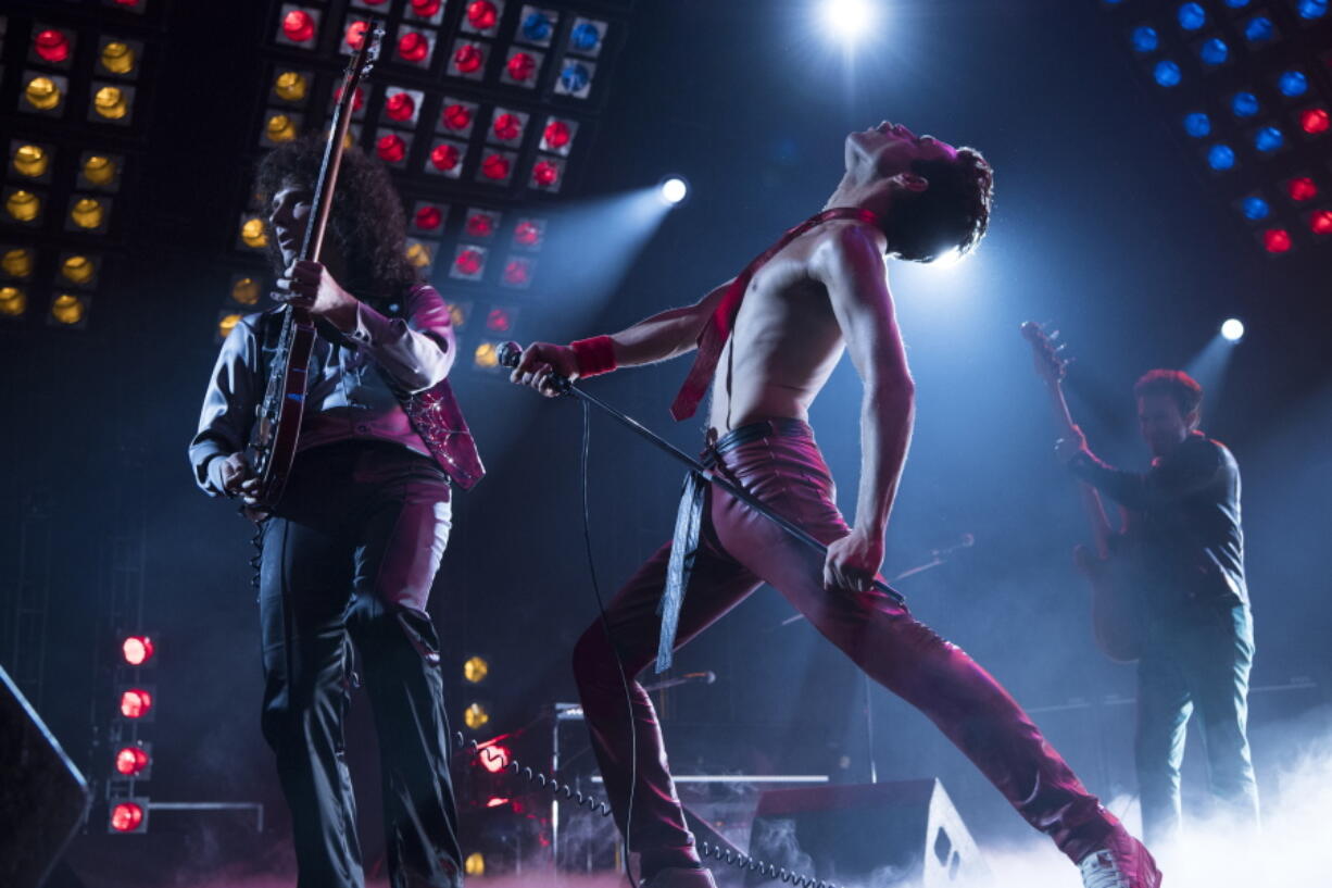 This image released by Twentieth Century Fox shows Gwilym Lee, from left, Rami Malek and Joe Mazzello in a scene from “Bohemian Rhapsody.” On Thursday, Dec. 6, 2018, the film was nominated for a Golden Globe award for best motion picture drama. The 76th Golden Globe Awards will be held on Sunday, Jan. 6.