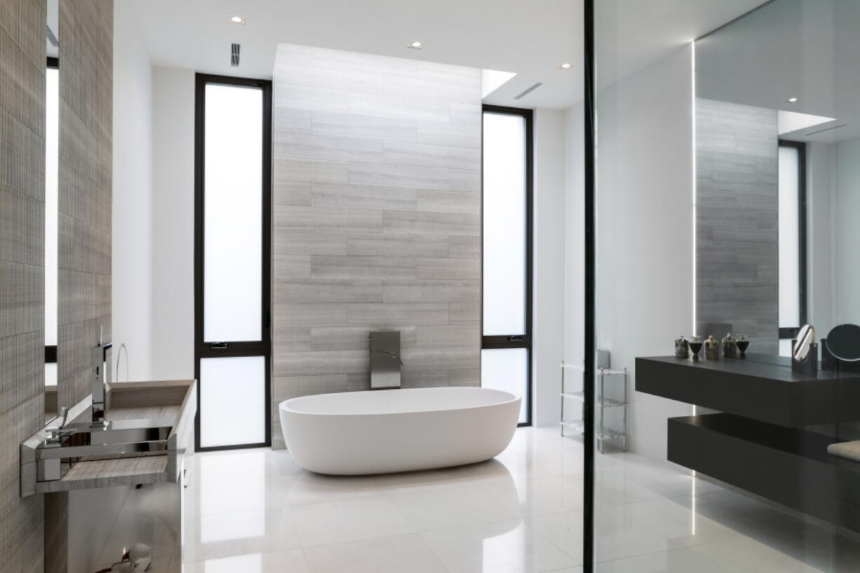 This photo shows the contrast of painted walls and tiled areas, as seen in this McLean, Va., master bathroom, which can make the tiles a more noticeable focal point.