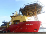 The Ocean Zephyr stands docked in Bremerhaven, Germany, Wednesday Jan. 23, 2019. The Britain-based Nekton Mission will use submarines to go 300 meters below the surface and sonar equipment to survey depths of up to 2,000 meters once the Ocean Zephyr reaches the Seychelles. Final preparations were being made Thursday for the start of an unprecedented, years-long mission to explore the Indian Ocean, during which scientists hope to document changes taking place beneath the waves that could affect billions of people in the surrounding region over the coming decades.