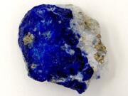 This undated photo released by the Max Planck Institute for the Science of Human History in Jena, Germany, shows a piece of lapis lazuli. During the European Middle Ages, Afghanistan was the only known source of the rare blue stone which at the time was ground up and used as a pigment. Modern-day scientists who examined the 1,000 year-old remains of a middle-aged woman in Germany discovered the semi-precious stone in the tartar on her teeth. From that, they concluded the woman was an artist involved in creating illuminated manuscripts, a task usually associated with monks. The find is considered the most direct evidence yet of a woman taking part in the making of high-quality illuminated manuscripts, the lavishly illustrated religious and secular texts of the Middle Ages. And it corroborates other findings that suggest female artisans were not as rare as previously thought.