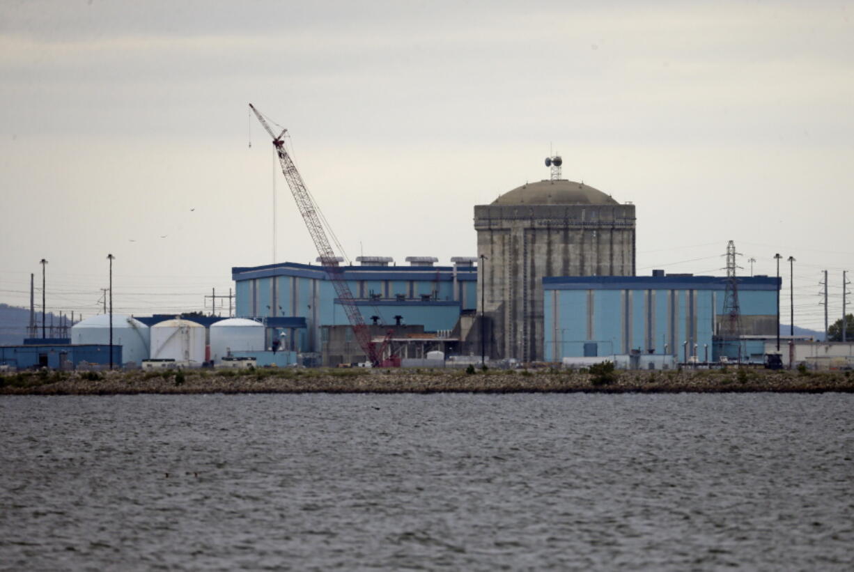 FILE - This Sept. 21, 2016 file photo shows Unit one of the V.C. Summer Nuclear Station near Jenkinsville, S.C. Dominion Energy says it’s completed a merger with the South Carolina utility reeling in the wake of a multibillion-dollar nuclear construction failure. The Virginia-based company made the announcement Wednesday, Jan. 2, 2019 about its deal with SCANA Corp.