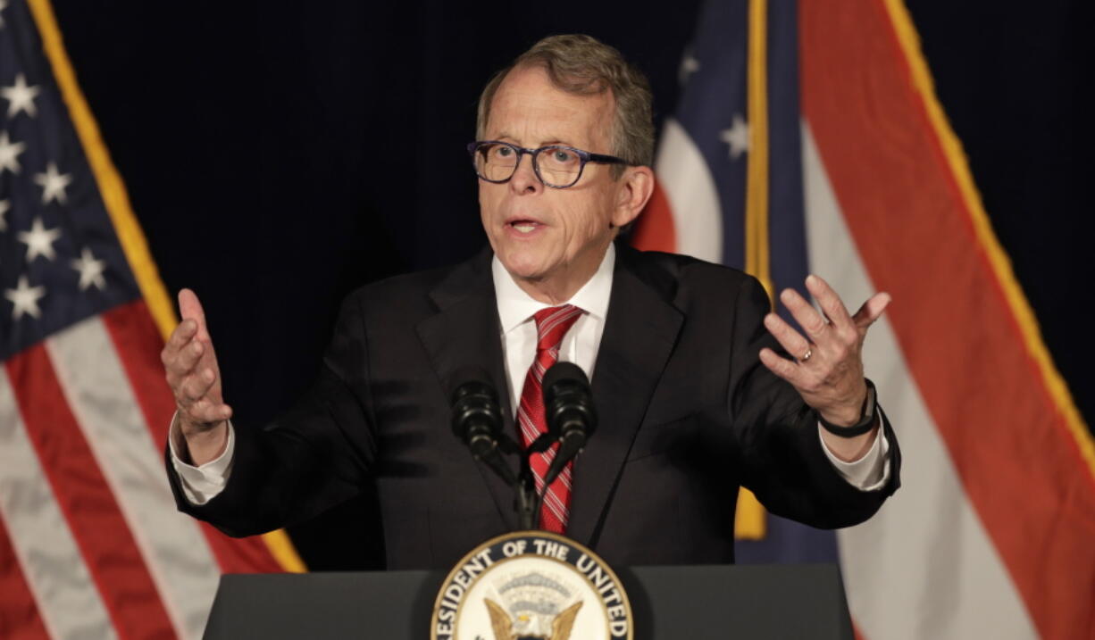 FILE - In this Oct. 31, 2018, file photo, Mike DeWine, Republican candidate for Ohio Governor, speaks at the Mansfield Lahm Regional Airport in Mansfield, Ohio. The inauguration of Gov.-elect DeWine will mark a shift away from volatility in a state buffeted in recent years between the shifting ambitions of an outspoken governor and the frequent outbursts of an unpredictable president. Even before taking office Monday, DeWine has moved through the transition process with a methodical calm.