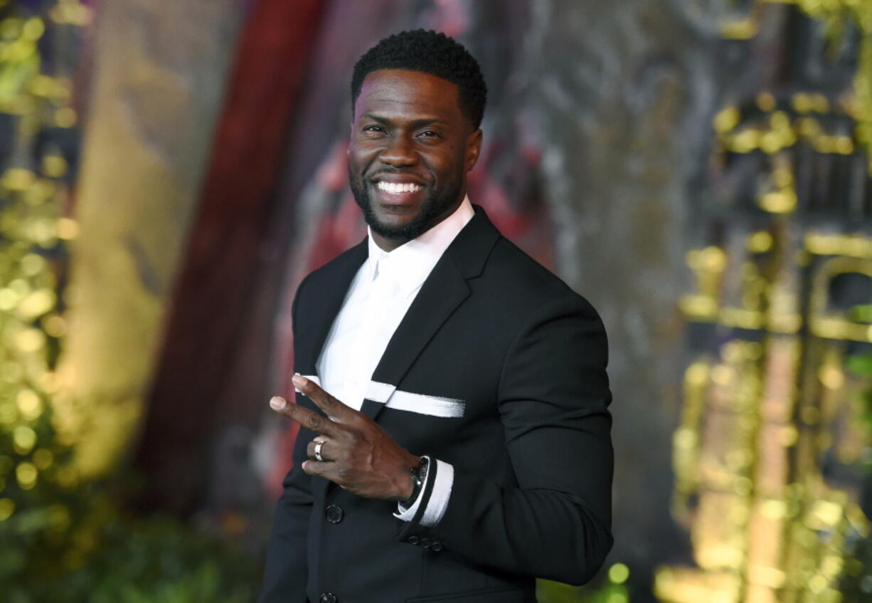 FILE - In this Dec. 11, 2017 file photo, Kevin Hart arrives at the Los Angeles premiere of “Jumanji: Welcome to the Jungle” in Los Angeles. Hart says he won’t be hosting the Academy Awards. “No,” was his response when asked Wednesday, Jan. 9, 2019 on ABC’s “Good Morning America.” Hart said it’s too late to prepare.