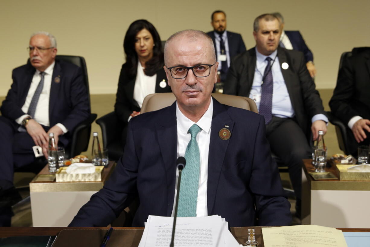 FILE - In this Sunday, Jan. 20, 2019 file photo, Palestinian Prime Minister Rami Hamdallah, attends the Arab Economic and Social Development Summit, in Beirut, Lebanon. On Tuesday, Jan. 29, 2019, Hamdallah offered the resignation of his government to Palestinian President Mahmoud Abbas, in a new step toward ending a failed attempt at reconciling with the rival Hamas movement. Abbas did not immediately act on the resignation offer submitted Tuesday by Prime Minister Rami Hamdallah.