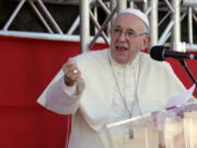 Pope Francis speaks to volunteers who worked at the World Youth Day event, before his departure in Panama City, Sunday, Jan. 27, 2019.