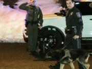 This photo provided by Newberry Township Police shows Newberry Township Police Sgt. Chris Martinez and his K9 partner Tazer being saluted before the dog is euthanized Wednesday, Jan. 23, 2019 in Etters, Pa. Newberry Township Police Chief Steven Lutz says 9-year-old German Shephard Tazer didn’t seem well after his last shift on Saturday night. Sgt. Chris Martinez, his handler, took him to the vet on Tuesday and learned Tazer had bone cancer in both hind legs, and one of the legs was broken.