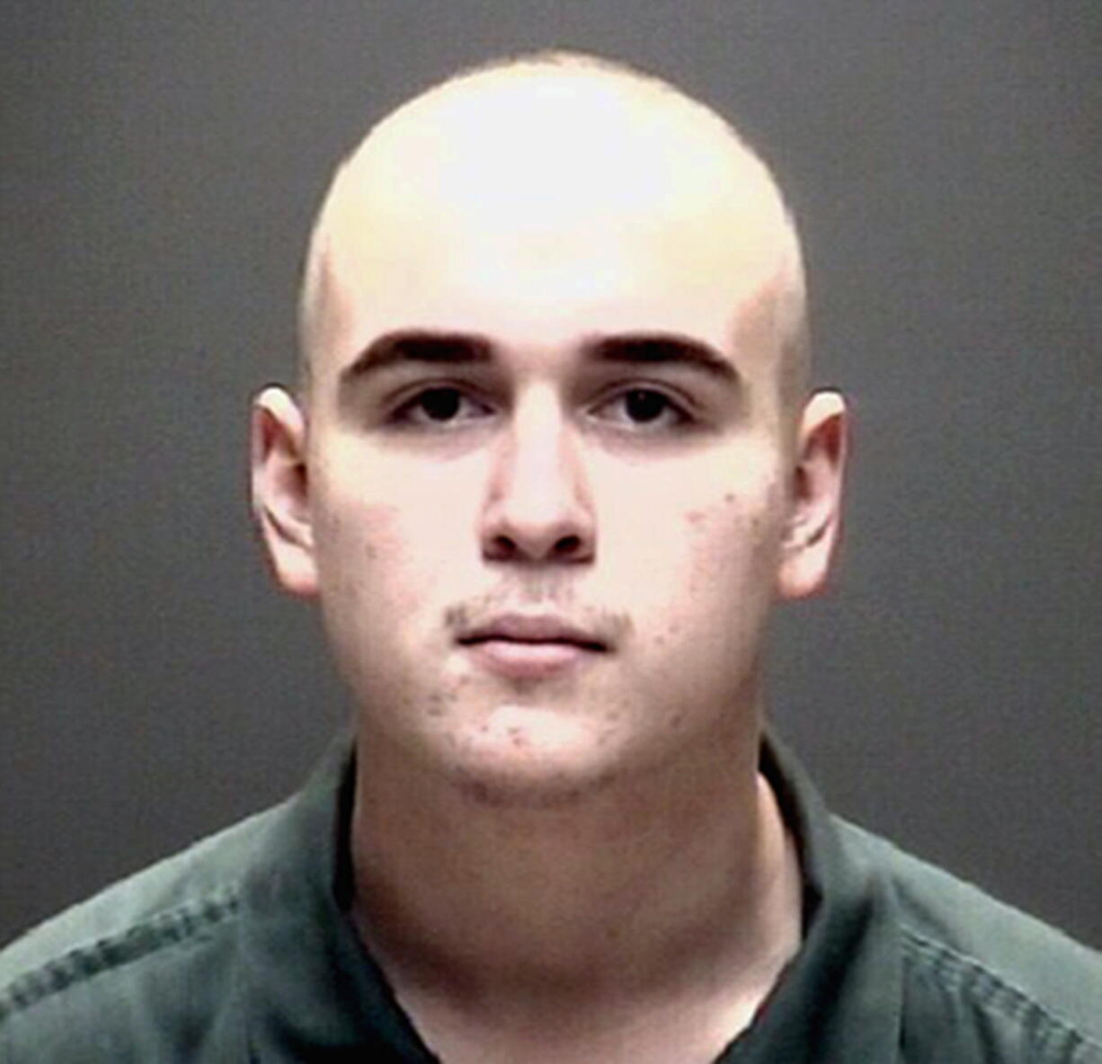 FILE - This file photo provided by the Galveston County Jail in Galveston, Texas, hows Dimitrios Pagourtzis. A change of venue is being sought for Pagourtzis, who is charged with capital murder in the fatal shooting of 10 people at a Texas high school on May 10, 2018. Attorneys for Pagourtzis filed a motion Tuesday, Jan. 8, 2019, in Galveston County District Court saying media coverage prejudice within the community prevents Pagourtzis from receiving a fair trial.