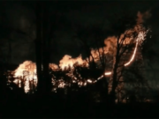 Overloaded power lines fall in this image from video captured late Saturday night by Melissa Martin. The arcing lines were high-voltage Bonneville Power Administration transmission lines.