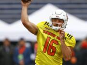 Gardner Minshew II of Washington State throws a pass during practice for Saturday’s Senior Bowl in Mobile, Ala.