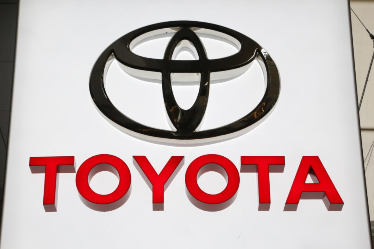 FILE- In this Feb. 15, 2018, file photo the Toyota logo displayed at the Pittsburgh Auto Show. Toyota is recalling 1.7 million vehicles in North America to replace potentially deadly Takata front passenger air bag inflators. The move announced Wednesday, Jan. 9, 2019, includes 1.3 million vehicles in the U.S. and is part of the largest series of automotive recalls in the nation’s history. (AP Photo/Gene J.