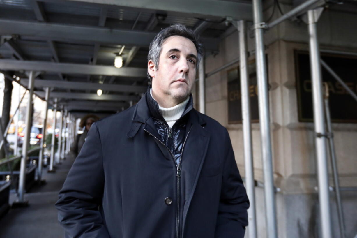 FILE - In this Dec. 7, 2018 file photo, Michael Cohen, former lawyer to President Donald Trump, leaves his apartment building in New York. A report by BuzzFeed News, citing two unnamed law enforcement officials, says that Trump directed Cohen to lie to Congress and that Cohen regularly briefed Trump on the project. The Associated Press has not independently confirmed the report.