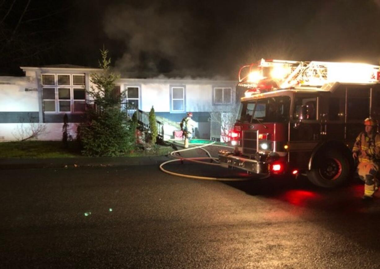 Clark County Fire & Rescue firefighters were called to this home near the corner of Sycamore Street and Heartwood Drive around 6 p.m. Thursday. Grease heated on a stove top ignited a fire that spread through its kitchen.