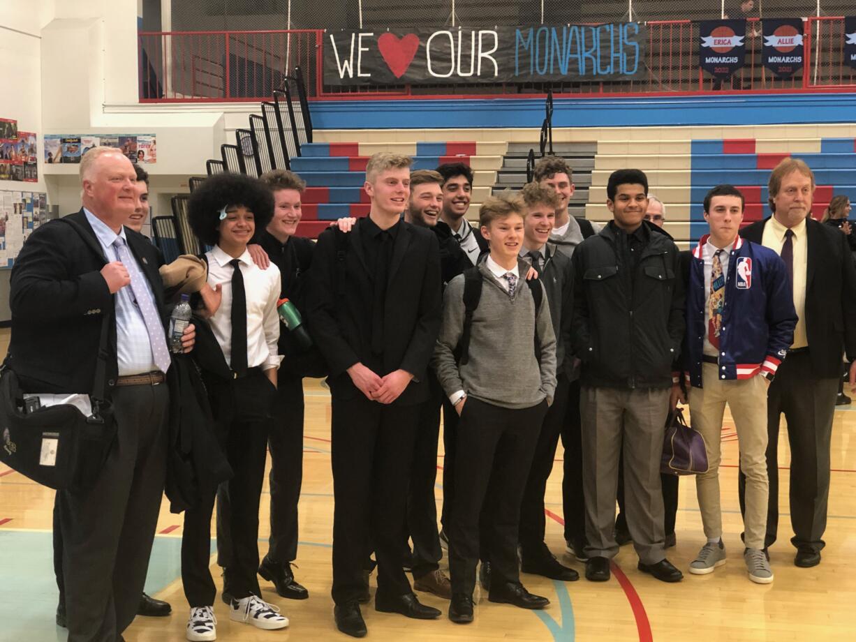 The Columbia River boys basketball team poses after beating Mark Morris 57-46 in Longview on Wednesday night.