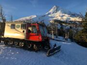 Members of a recovery team traveled by Snowcat to Cloud Cap Inn on the north side of Mount Hood on Wednesday morning before setting out on foot to the site of a plane crash.