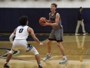 Union’s Tanner Toolson (21) has been described by Union coach Blake Conley as the Titans’ X-factor for his versatility on the court.