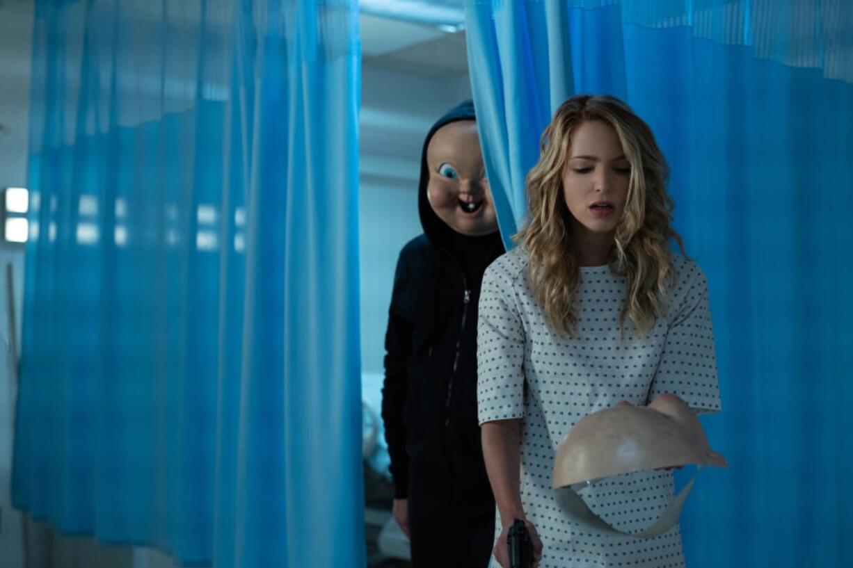 Jessica Rothe with “Babyface” in the horror sequel “Happy Death Day 2U.” Michele K.