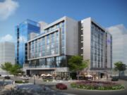 The Hotel Indigo and Kirkland Tower share a foundation and are being built as one project, but will operate as separate buildings. Kirkland Tower condo residents will be able to access the Hotel Indigo lobby to reach retail tenants such as El Gaucho.