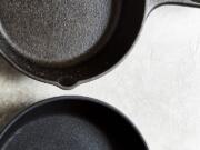 Cast iron, top, is often called the original nonstick pan.