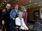 Bettyan Howard, known to a generation of Kiggins Theatre moviegoers as the loving but fearsome ‘Popcorn Betty,’ revisited the place with her daughters last April for a 90th birthday party in her honor. With Howard are her daughters Stephanie Leckwold, left, Nancy Lecouris and Bridget Howard-Falco.