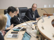 John Steach, Evergreen Public Schools superintendent, right, is apparently negotiating a resignation plan with the district.