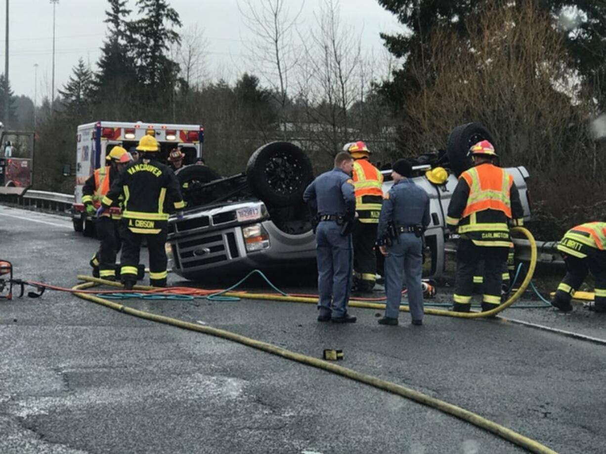 Vancouver firefighters respond to a single-vehicle rollover crash Friday on the Northeast 112th Avenue onramp to westbound state Highway 500. The driver was transported to an area hospital for evaluation.