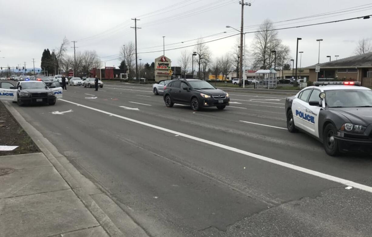 Vancouver police investigate after a man was run over Thursday afternoon by a black Subaru Crosstrek on Southeast Mill Plain Boulevard near Southeast 136th Street.